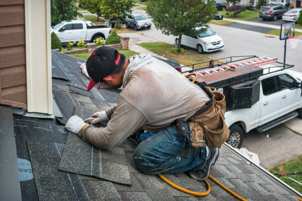 Professional Emergency Roof Repair technician working in Marshall, MI